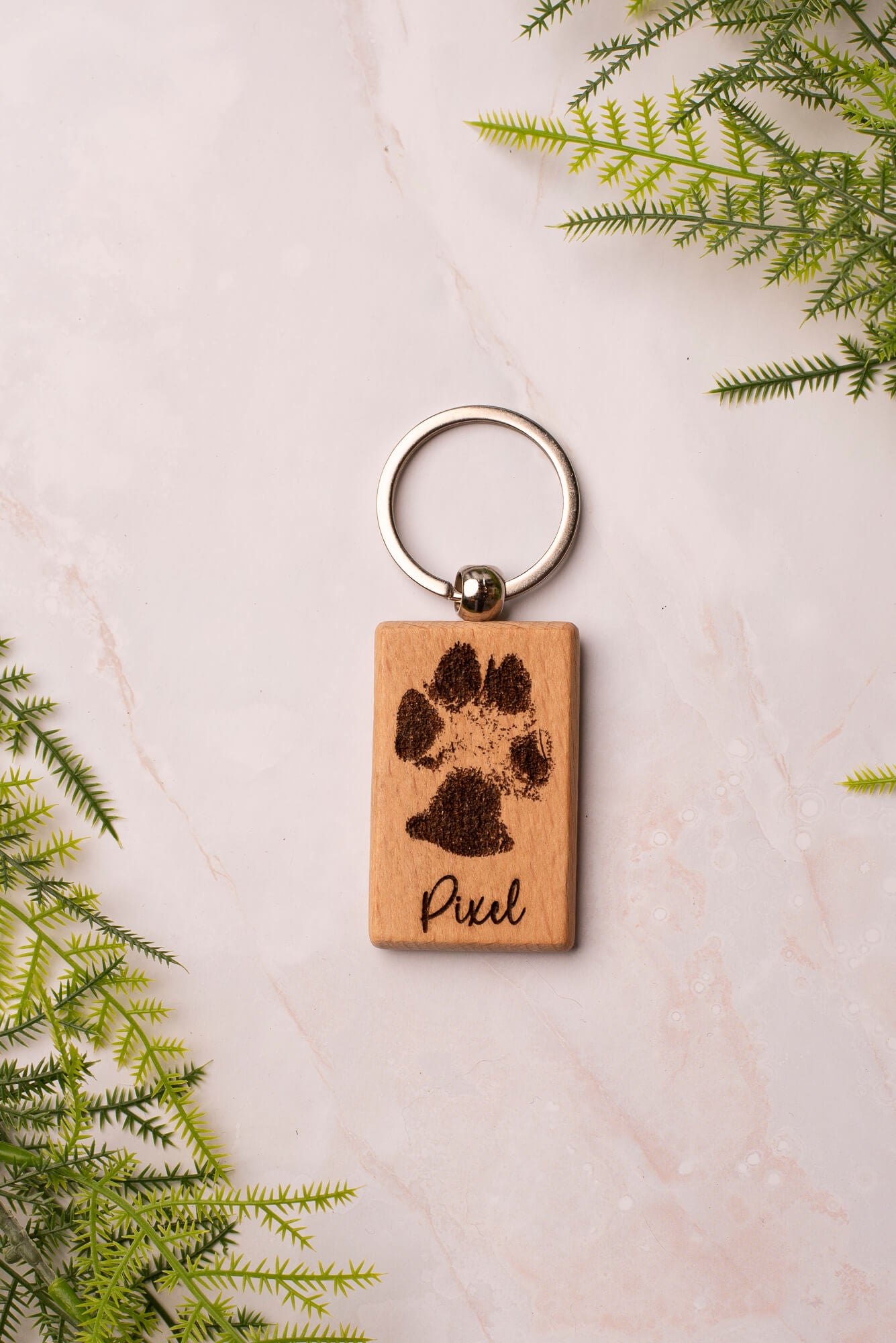 Sleutelhanger met pootafdruk